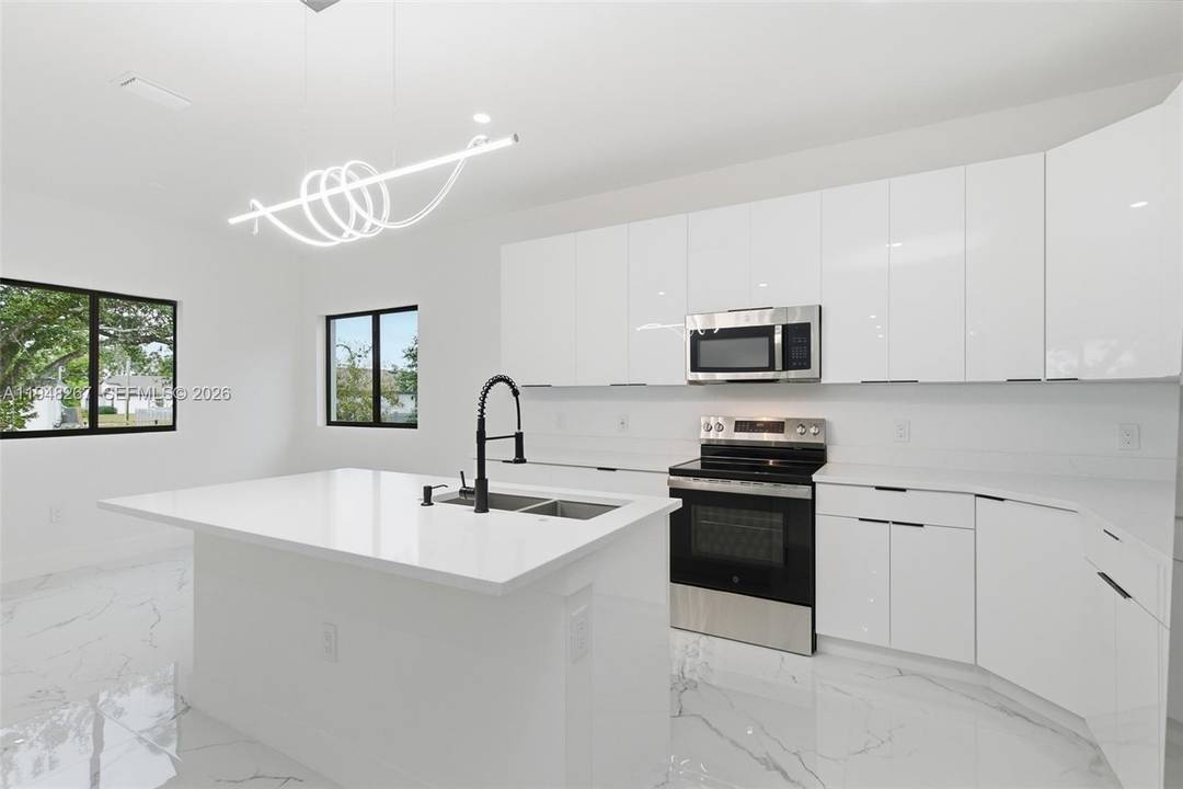 Welcome to this beautifully crafted new construction home located in the desirable residential neighborhood of Mirror Lakes.