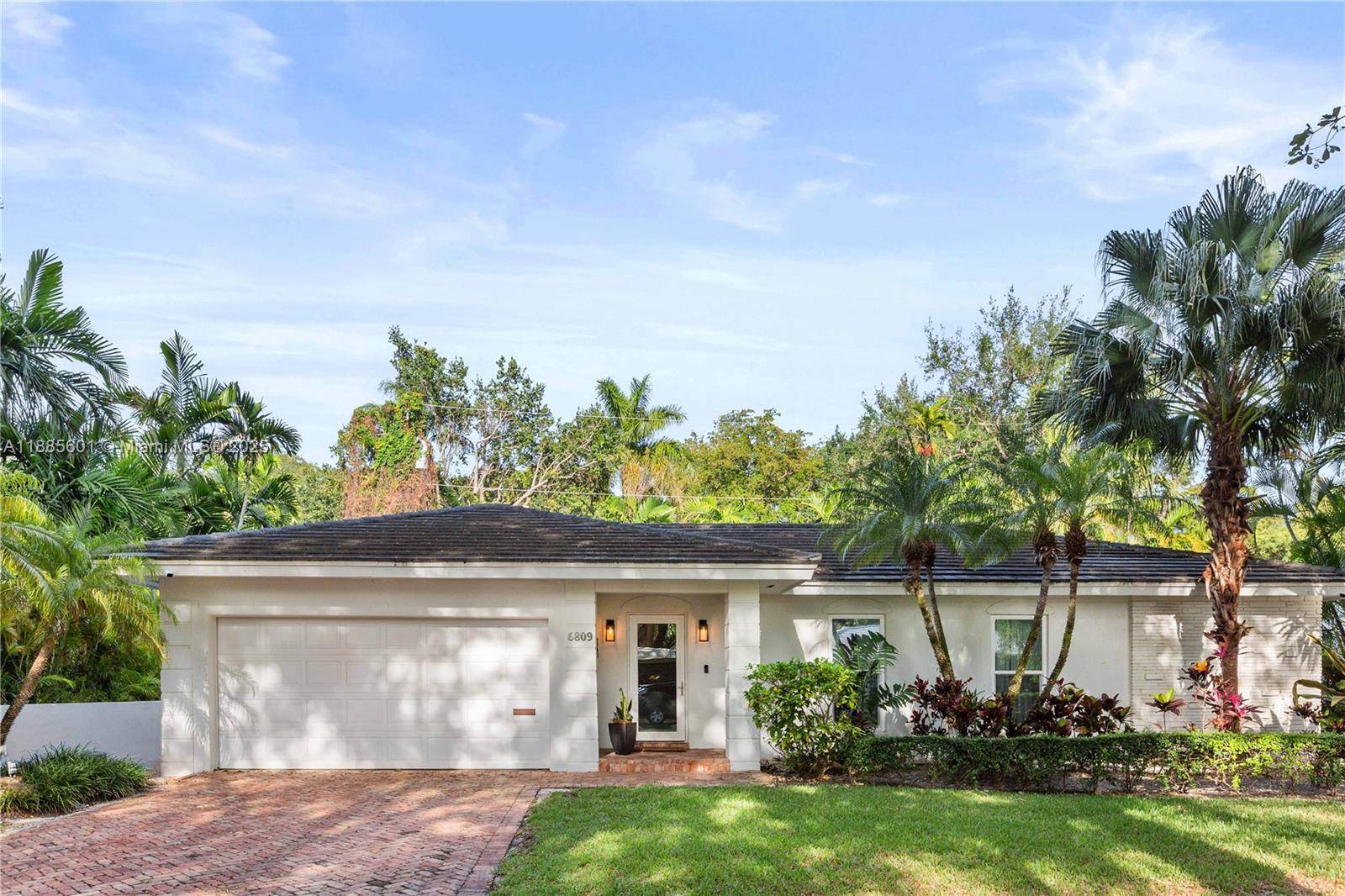 Beautiful 3 Bedroom, 2. 5 Bath home nestled among the trees in the South Gables.