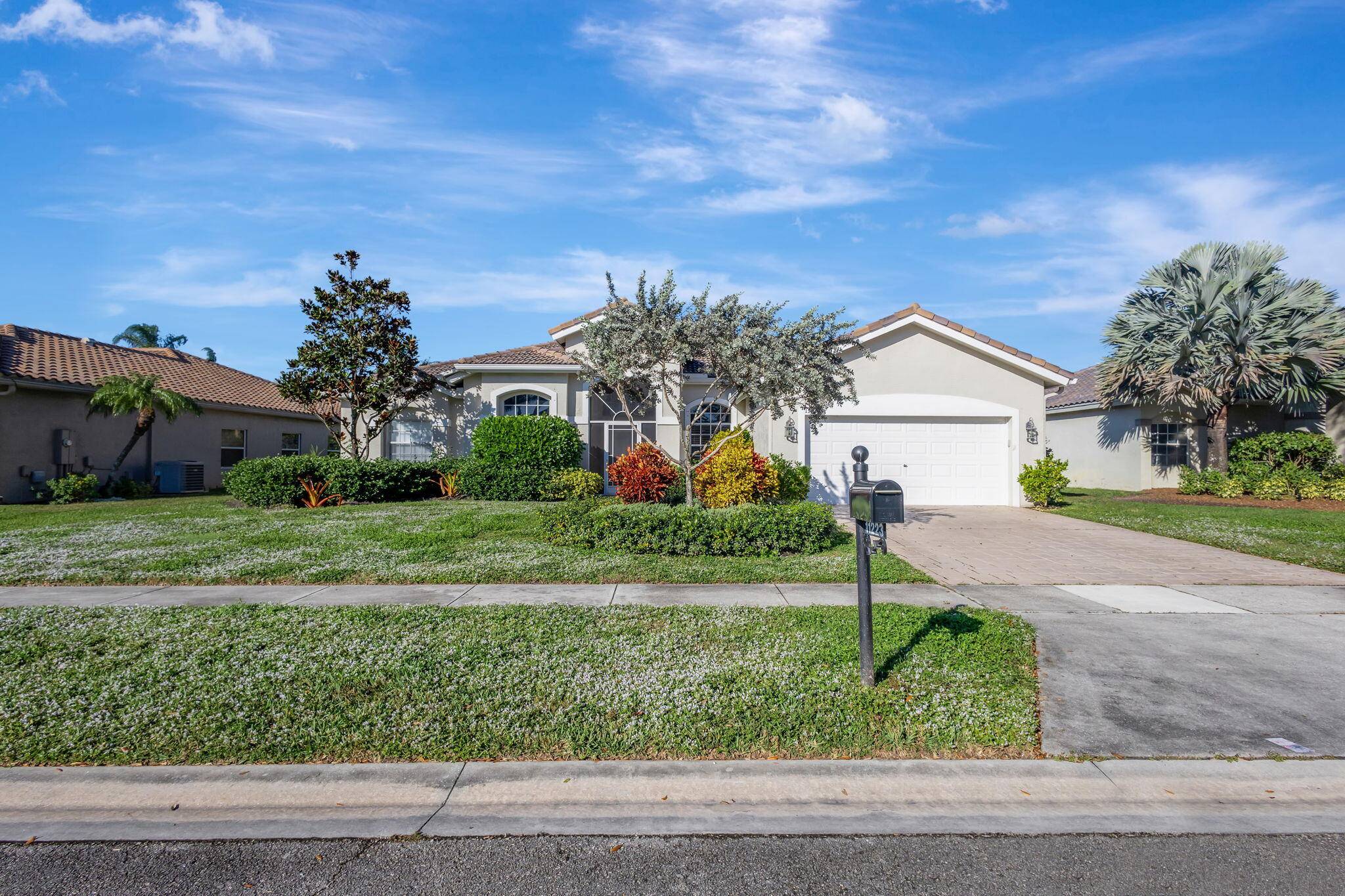 Charming and Quiet Cul de Sac One Story Home with breathtaking Wide Lake View and stunning private pool.