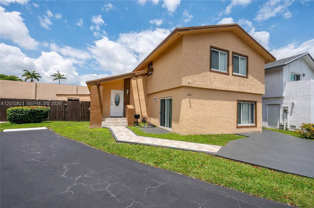 Welcome to this beautifully maintained two story home in the gated Fairway Lakes Village community.