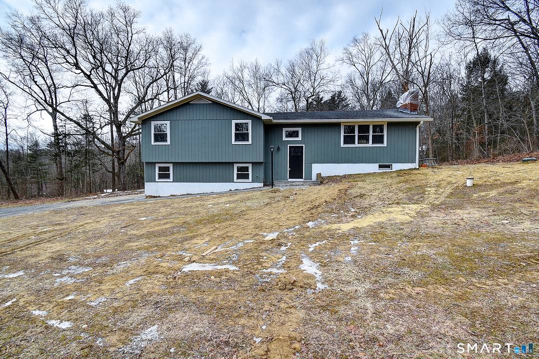 MOVE IN READY Welcome to this beautifully reimagined split level home, where classic design meets modern living in a peaceful neighborhood.