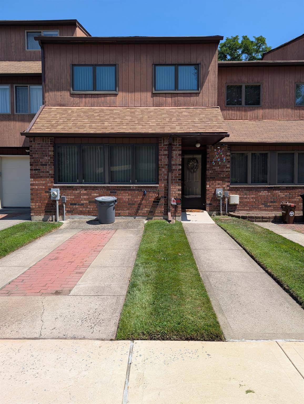 Step into this stunning townhome nestled in the highly sought after Stonegate Drive community.