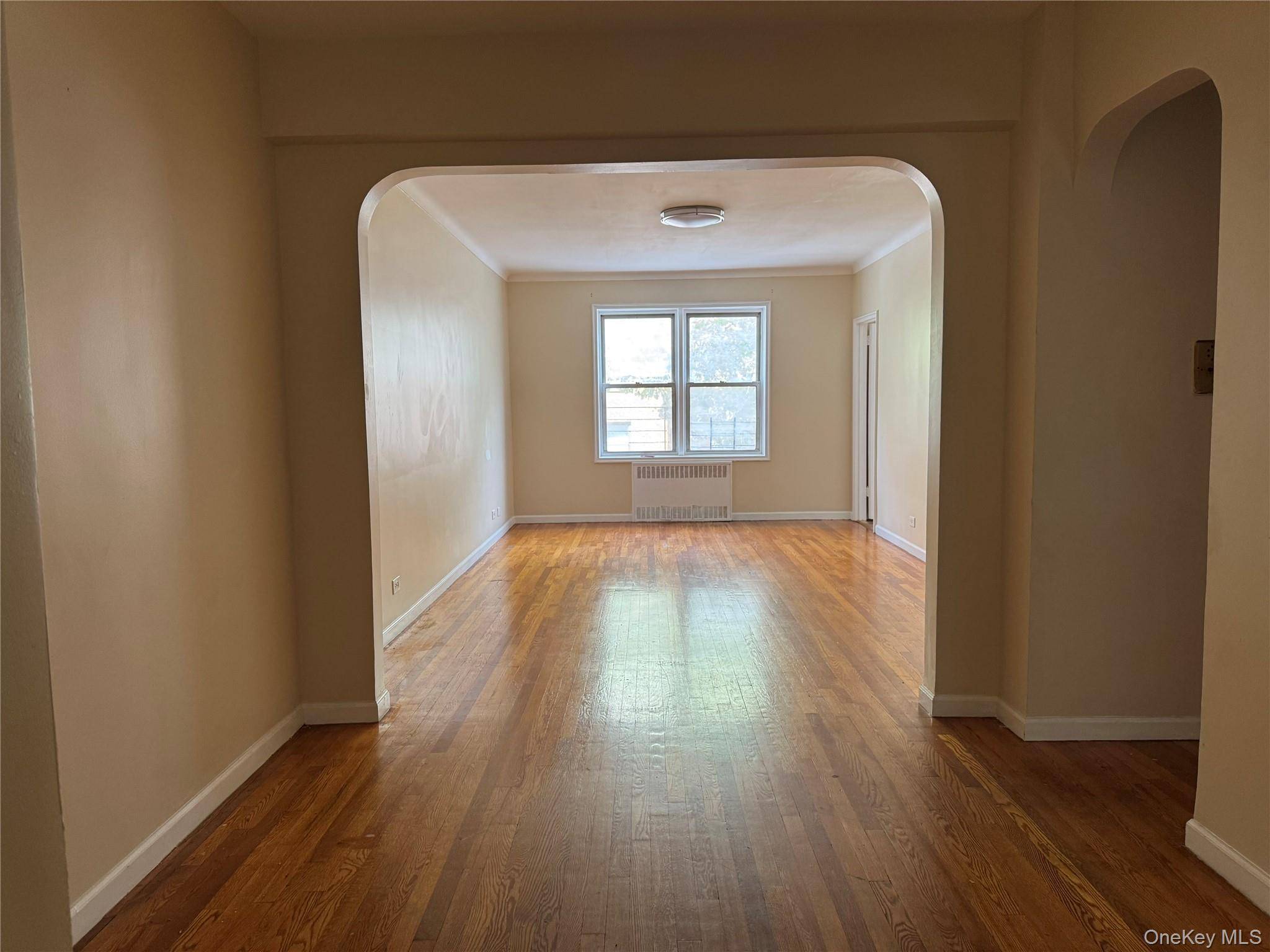 Massive 2 bedroom 1 bath CONDO on a tree lined block in the heart of Rego Park.