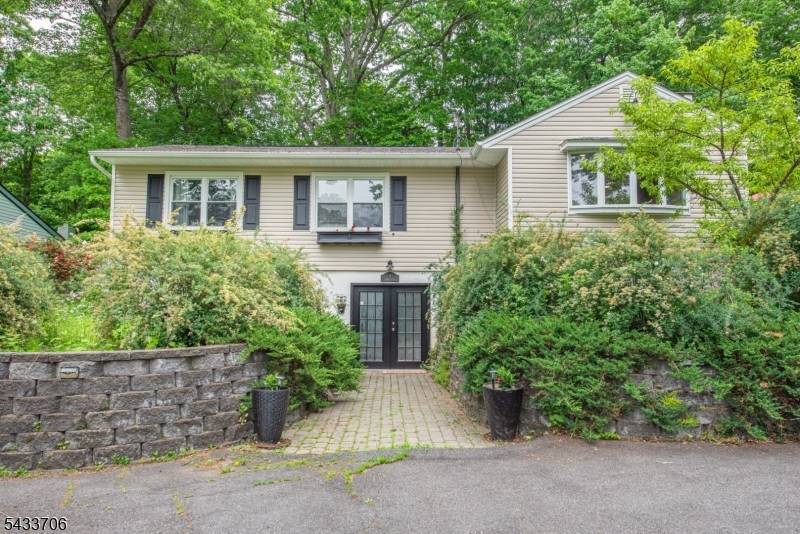 Welcome to this beautifully maintained 3 bedroom, 2 bath raised ranch set on a quiet, charming street in Lower West Milford that offers a private and tucked away feel, yet ...