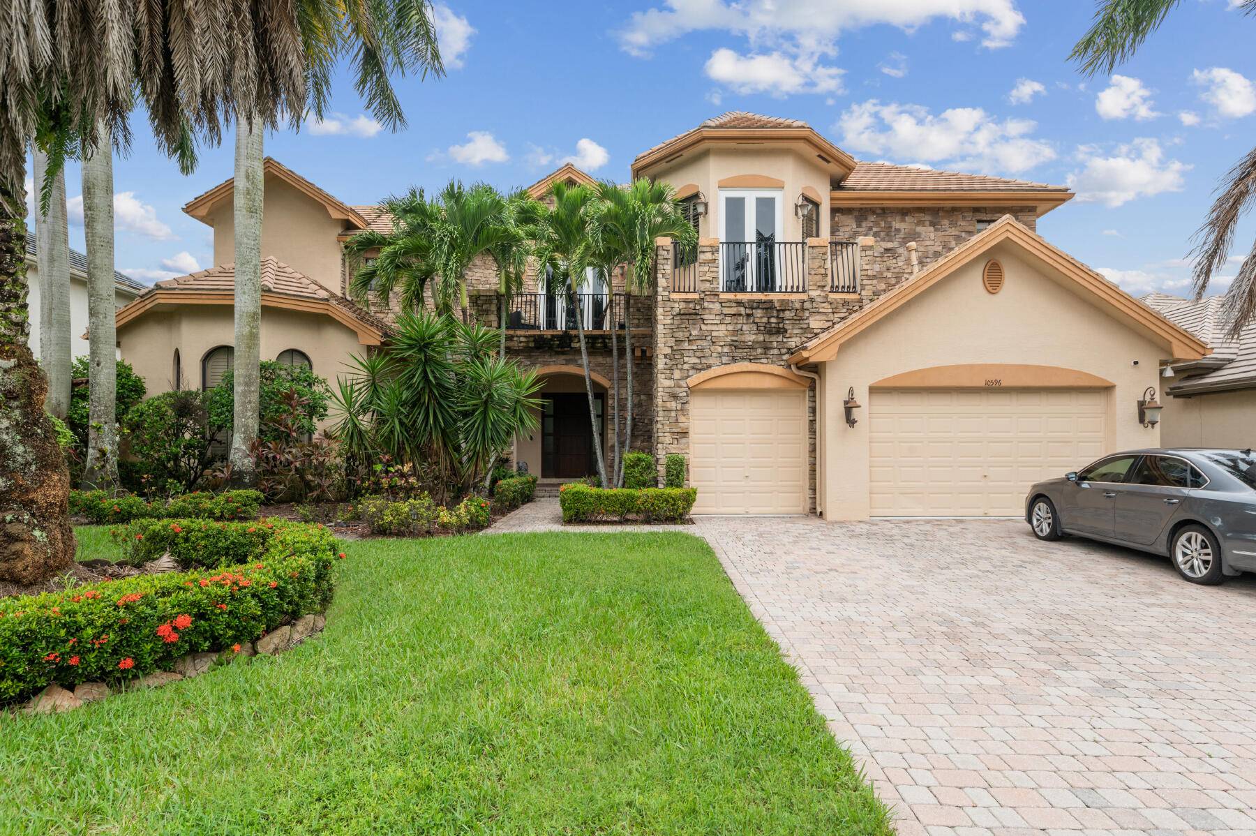 PRICE REDUCTION ! Nestled in the prestigious Versailles community.