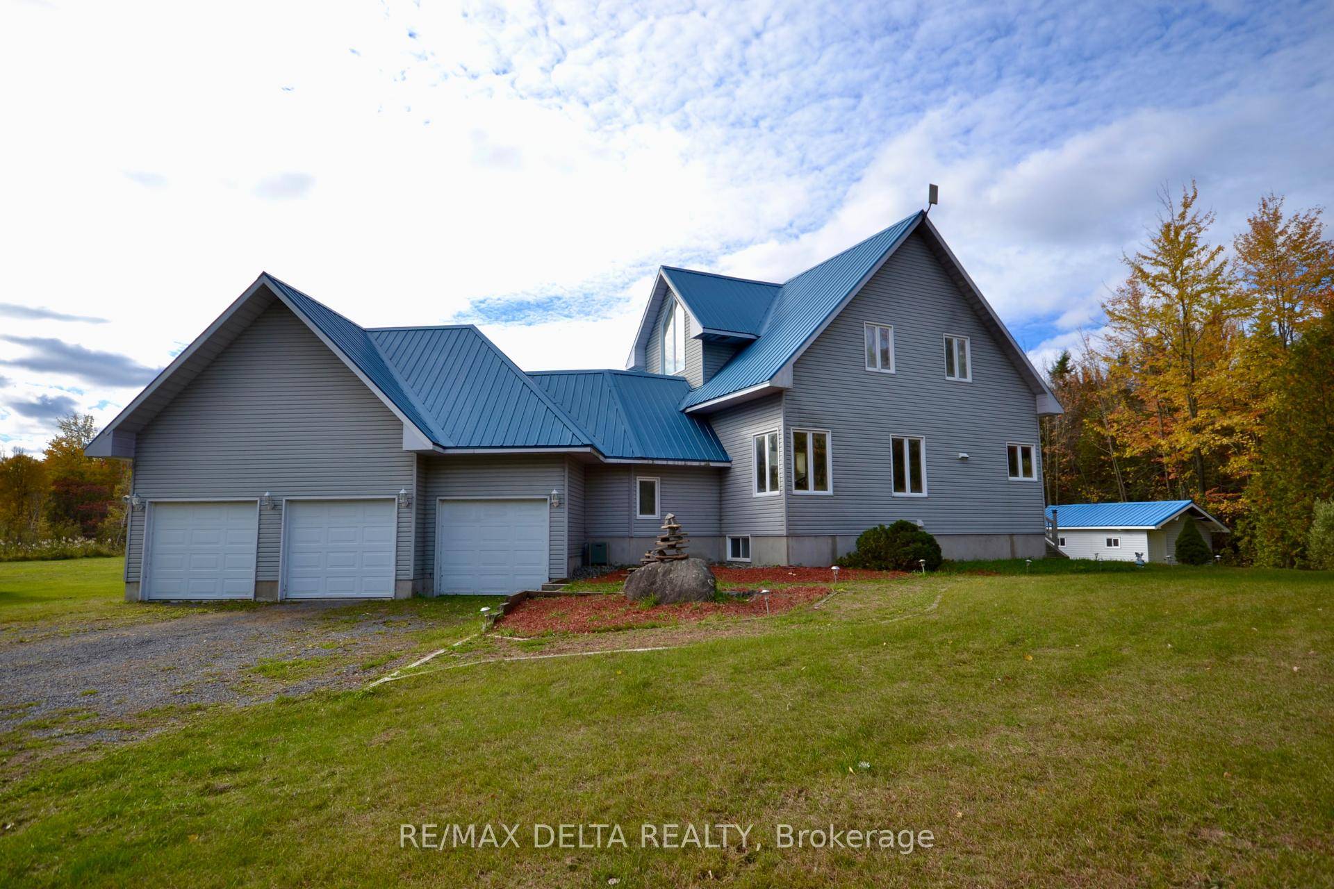 Spectacular private oasis on a 25 acres property with a huge pond.