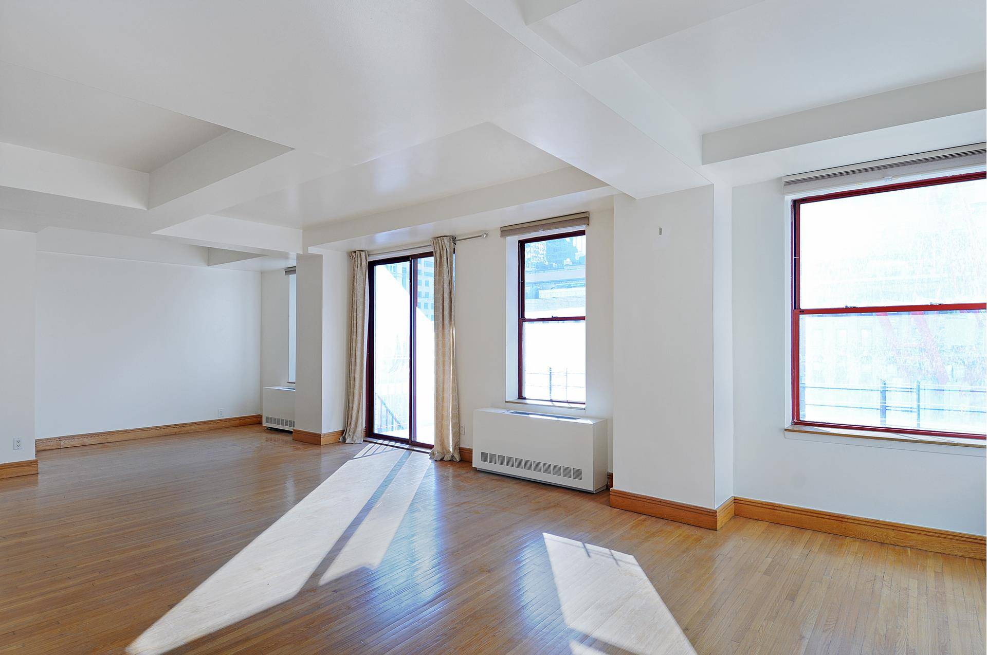 Elegant Sun drenched South facing Two bedroom Two baths home on the 14th floor boasts great light, open city views, high ceilings and Two large balconies.