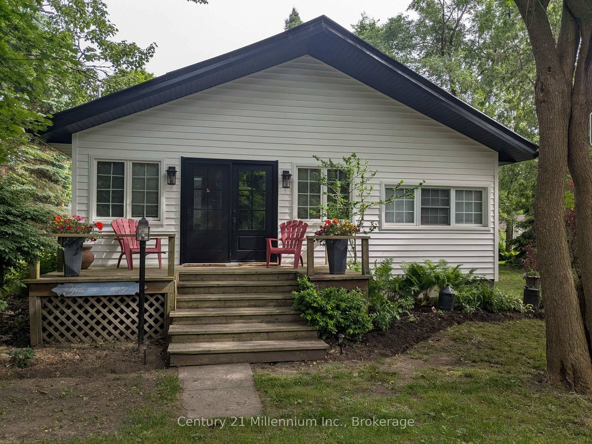 Updated charming three bedroom, one bathroom home located steps from Woodland Beach.