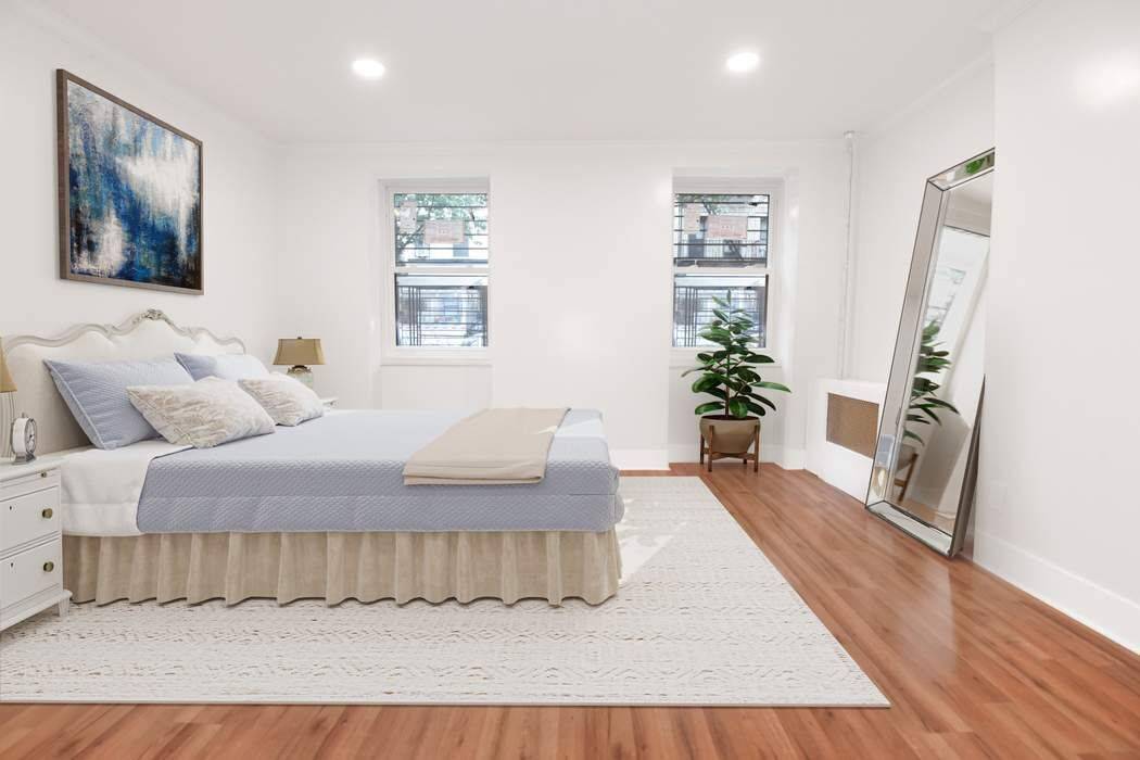 This beautifully renovated apartment in a classic brick townhouse is prime Williamsburg living at its best.