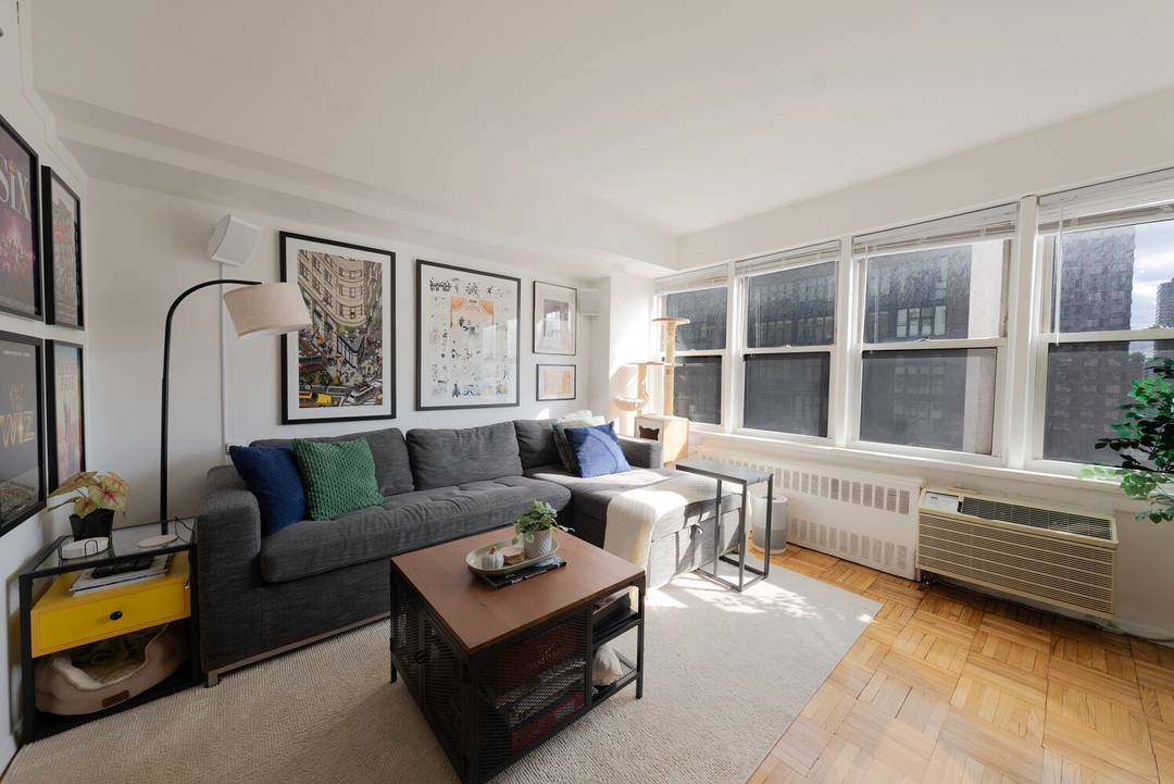 Welcome to Residence 15E at The 155 Condominium, a bright and spacious high floor one bedroom that is already converted to a two bedroom or home office layout offering the ...