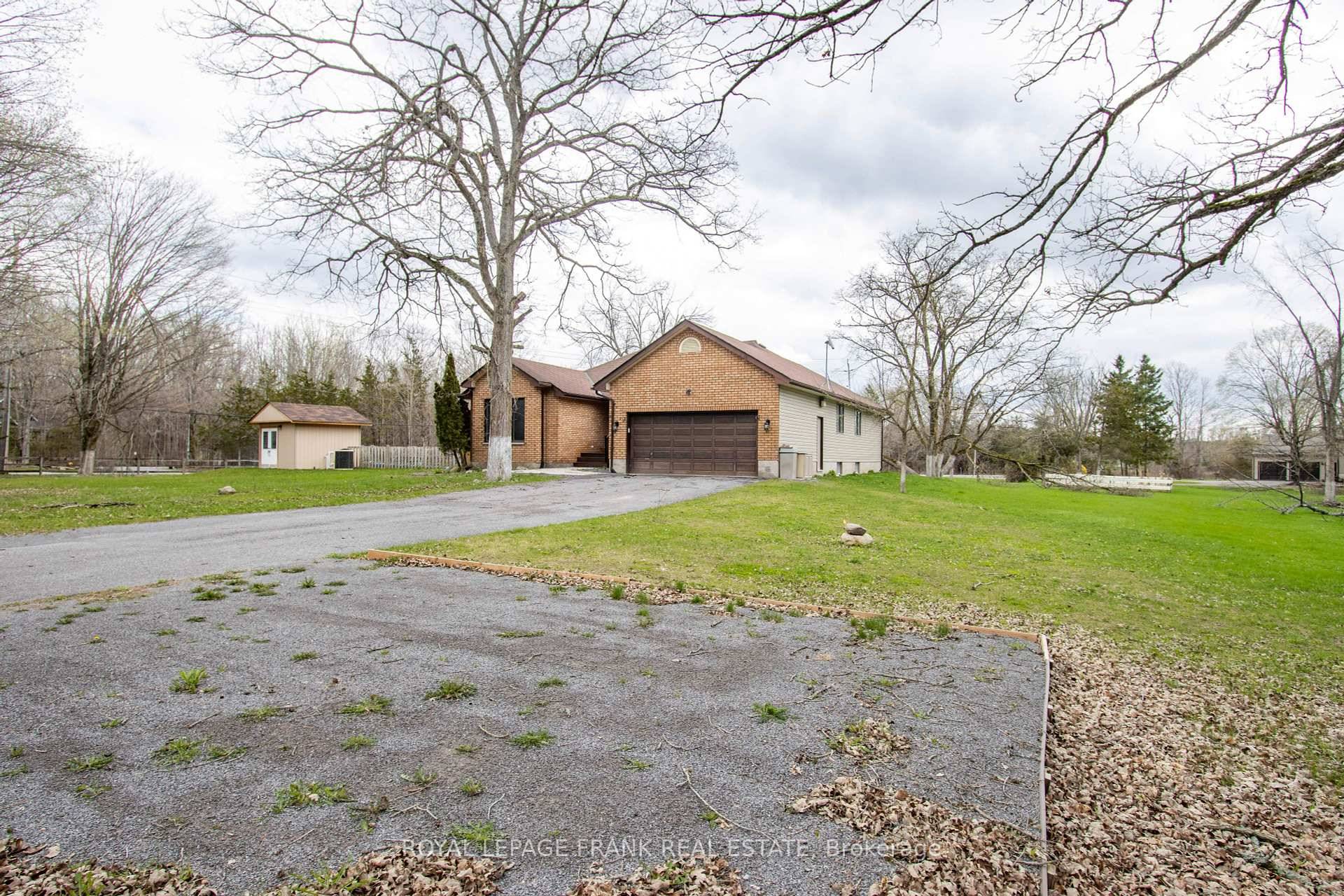 Escape to the serene beauty of this raised bungalow, perfectly positioned on 1.