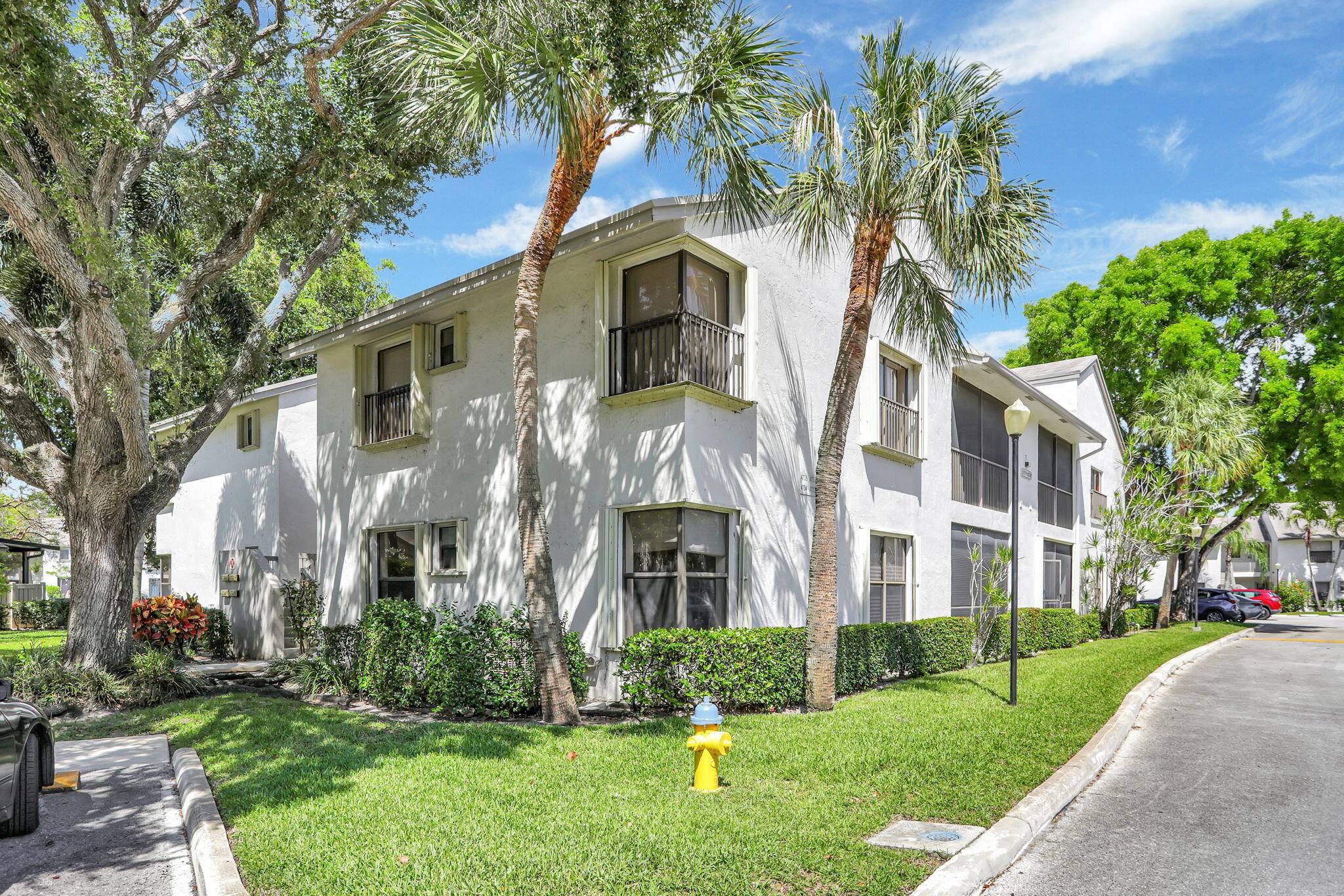 Ground floor unit featuring a split floor plan with 3 bedrooms and 2 bathrooms.