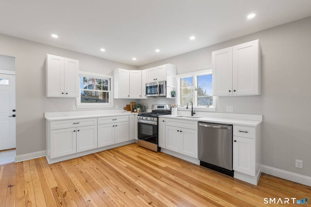 Exceptional two family Colonial, perfect for an owner occupant or investor seeking a fully renovated, turnkey property.