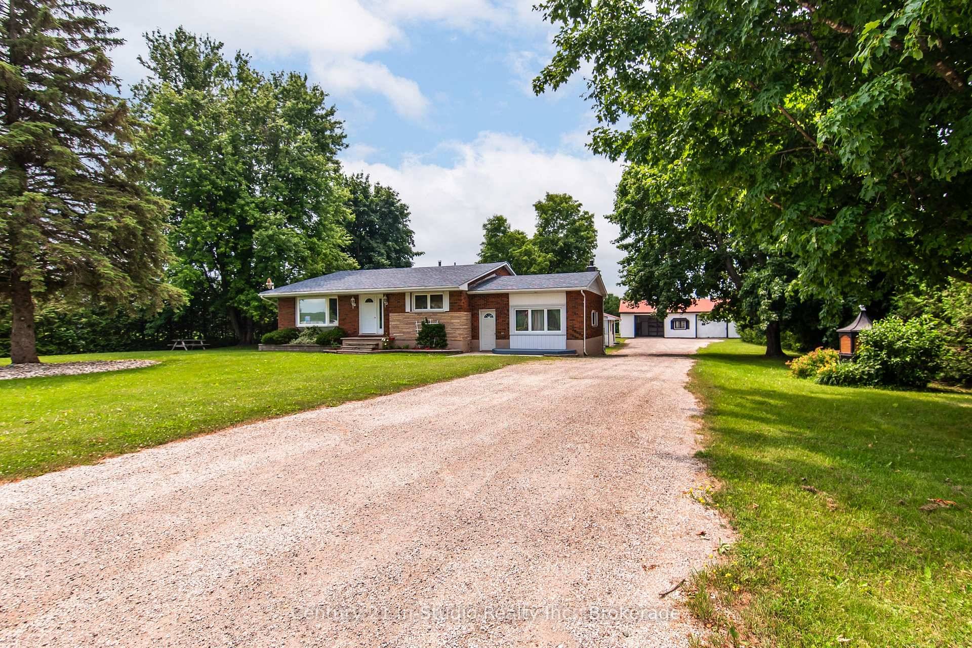 Escape to your ideal COUNTRY LIVING property, where quiet and tranquility meet convenience in this wonderful 4 bedroom, 2 bathroom, 4 level back split home.