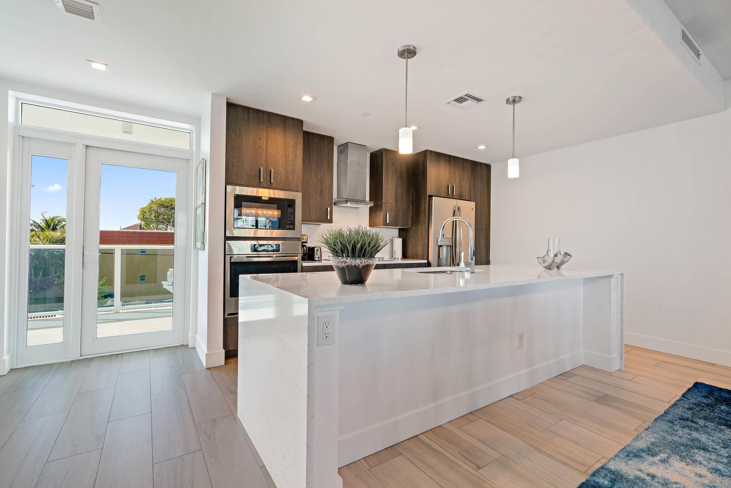 Residence 204 is a 1BR 1BA condominium in the modern building The ONE Luxury Condominiums.