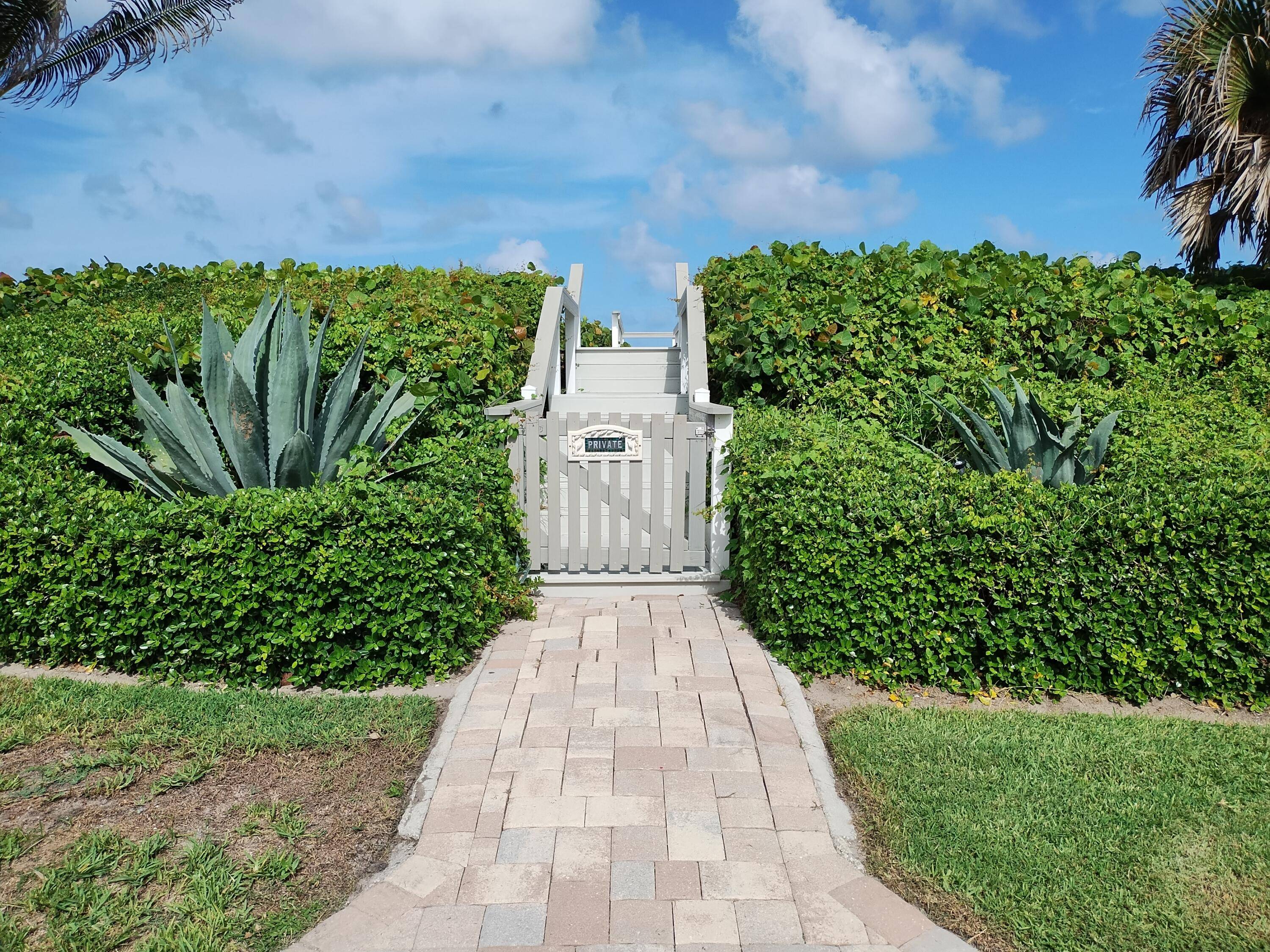 Direct Ocean Views with a private beach access and private pavilion right on the sand.