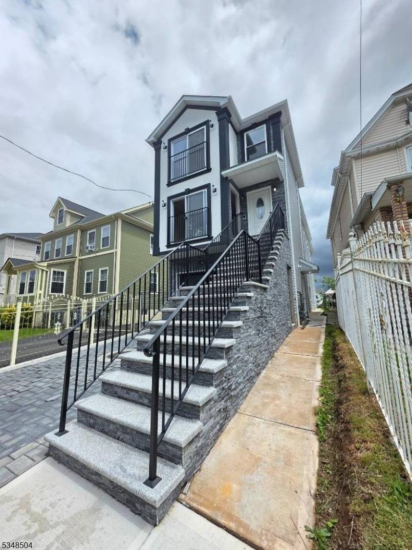 Coming Soon Welcome to this brand new construction 2 family with first unit having 3 bedrooms, 3 full bathrooms, eat in kitchen with granite countertops, laundry room, living room, and ...