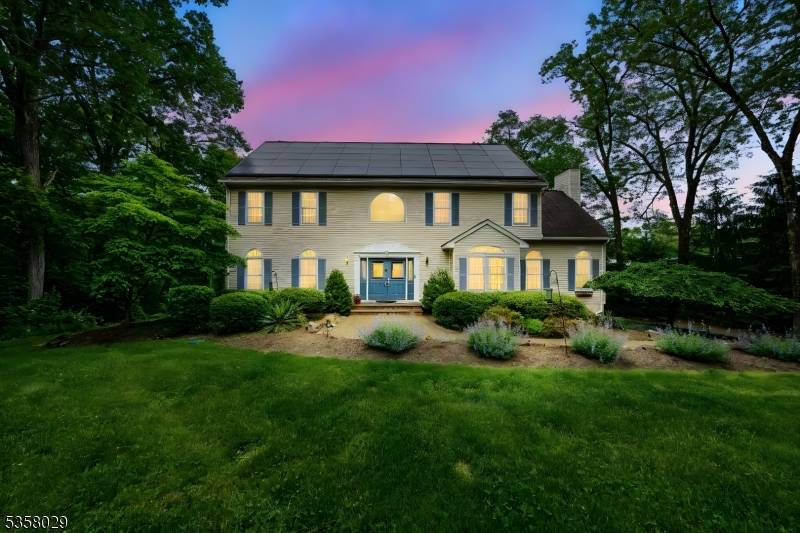 Situated on a beautifully landscaped cul de sac in Boonton Township, this captivating 4 bedroom, 3.