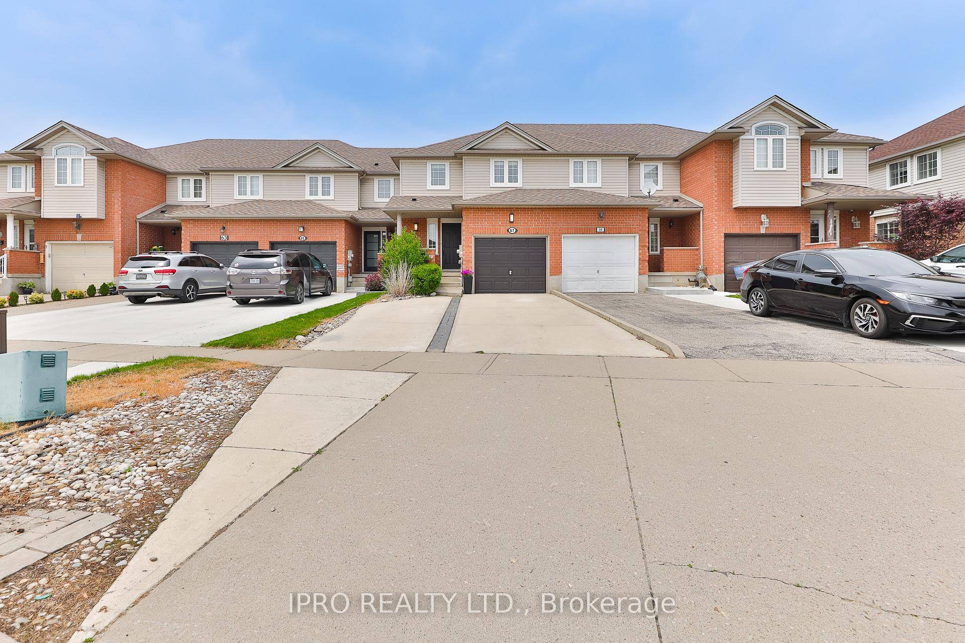 Beautifully Updated Townhome in One of Cambridge's Most Sought After Neighbourhoods !