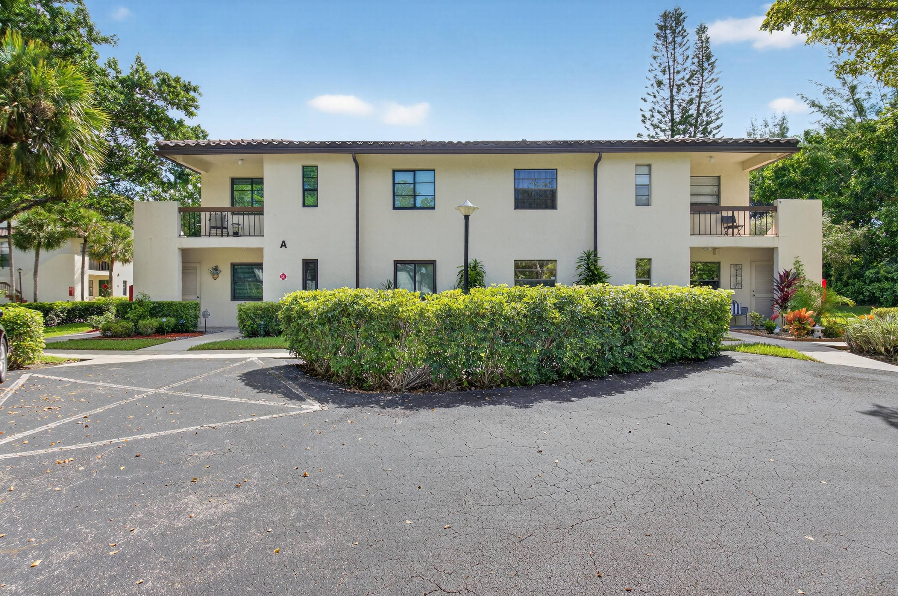 This meticulously maintained and move in ready corner unit condo in The Glades of Boca Lago offers both comfort and style in a manned, gated community.
