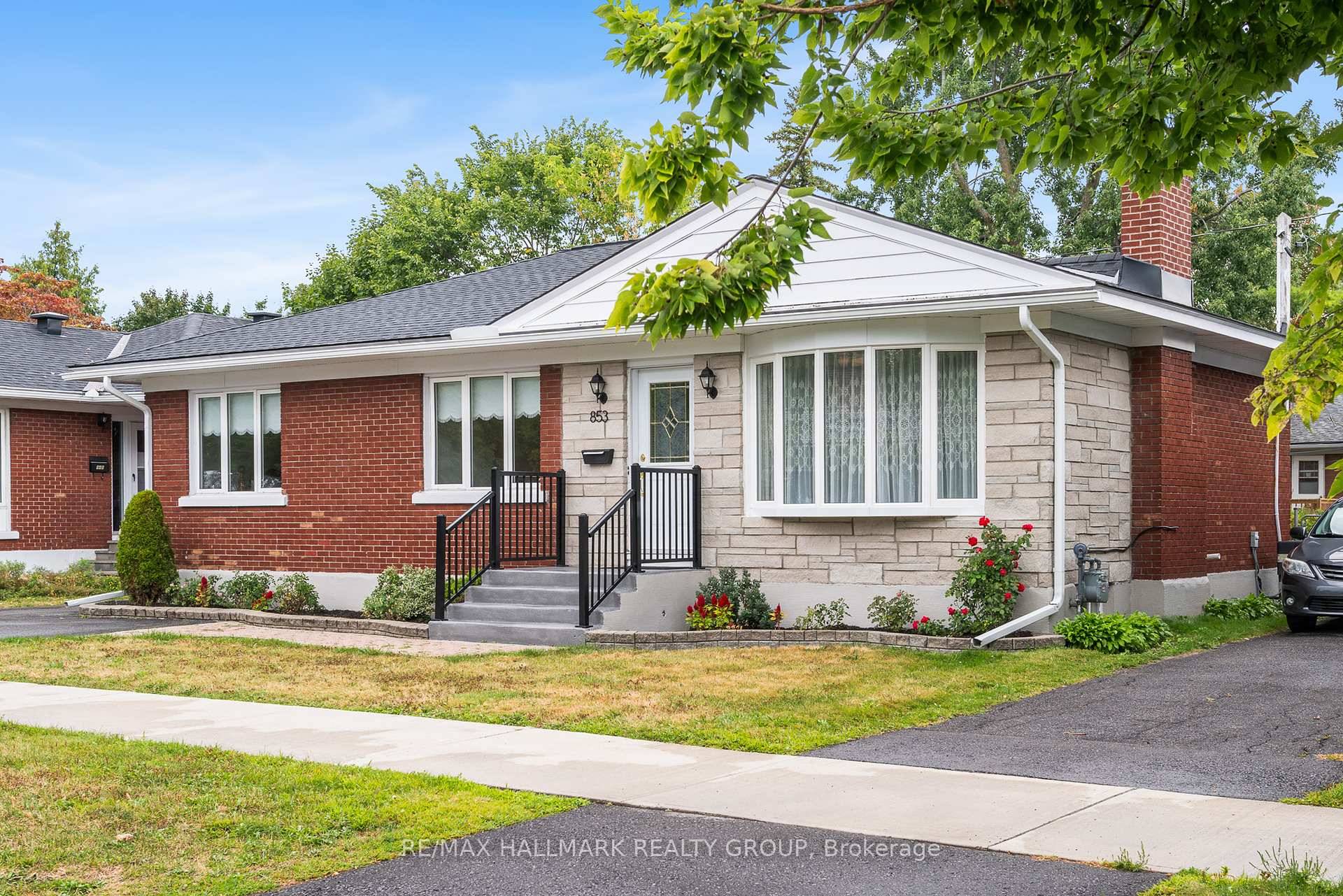 Charming 3 Bedroom Bungalow with Spacious Yard Prime Location !