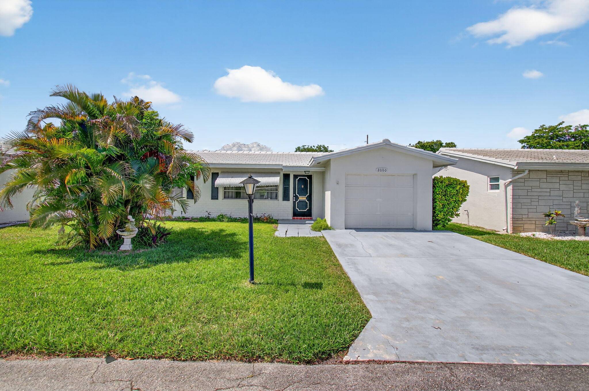 Charming Canal Front 2 Bed, 2 Bath Home with Stunning Upgrades !