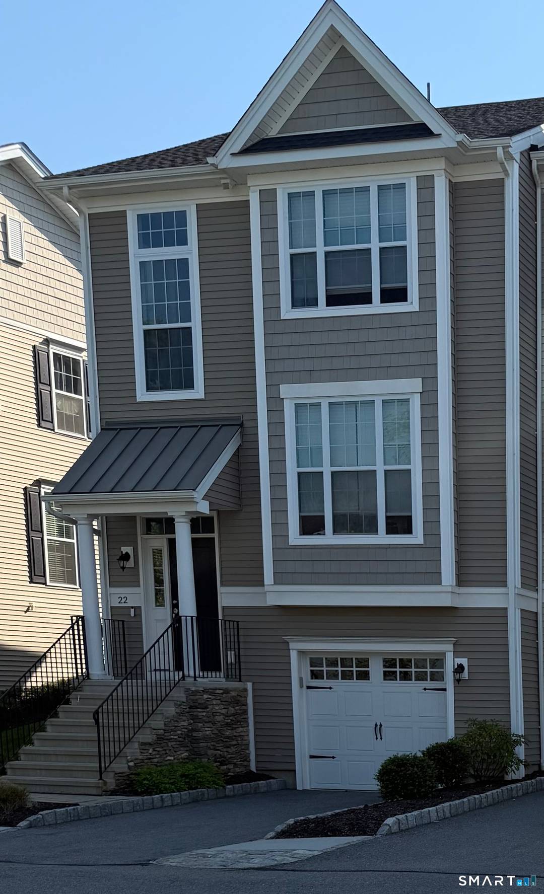 Set within the prestigious Rivington by Toll Brothers community, this gorgeous end unit offers a sophisticated blend of luxury, comfort, and modern design.
