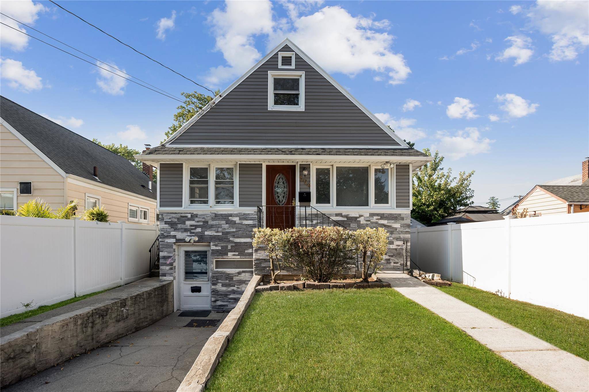 Welcome to this beautifully updated Cape in the heart of Franklin Square.