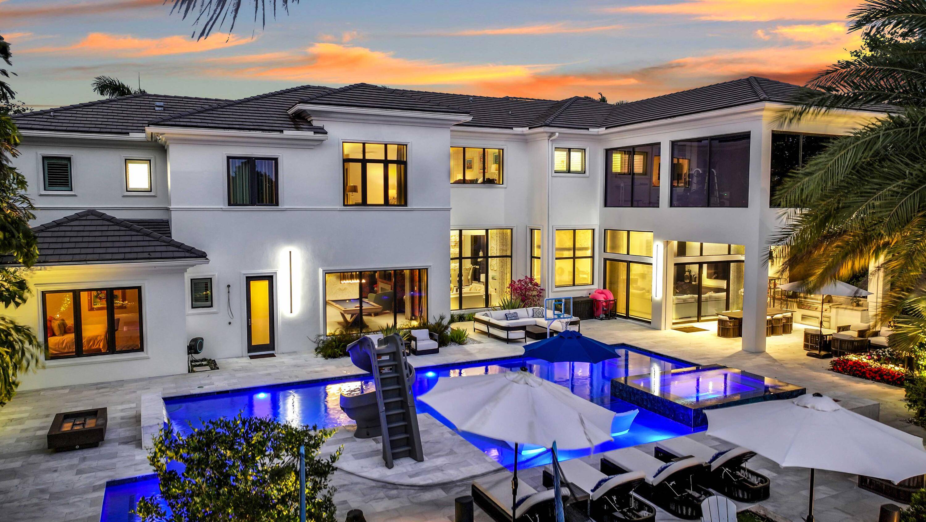 Rare opportunity to own a luxury custom estate with full golf equity membership available in prestigious Mizner Country Club, situated on the 18th fairway on Del Prado Dr.
