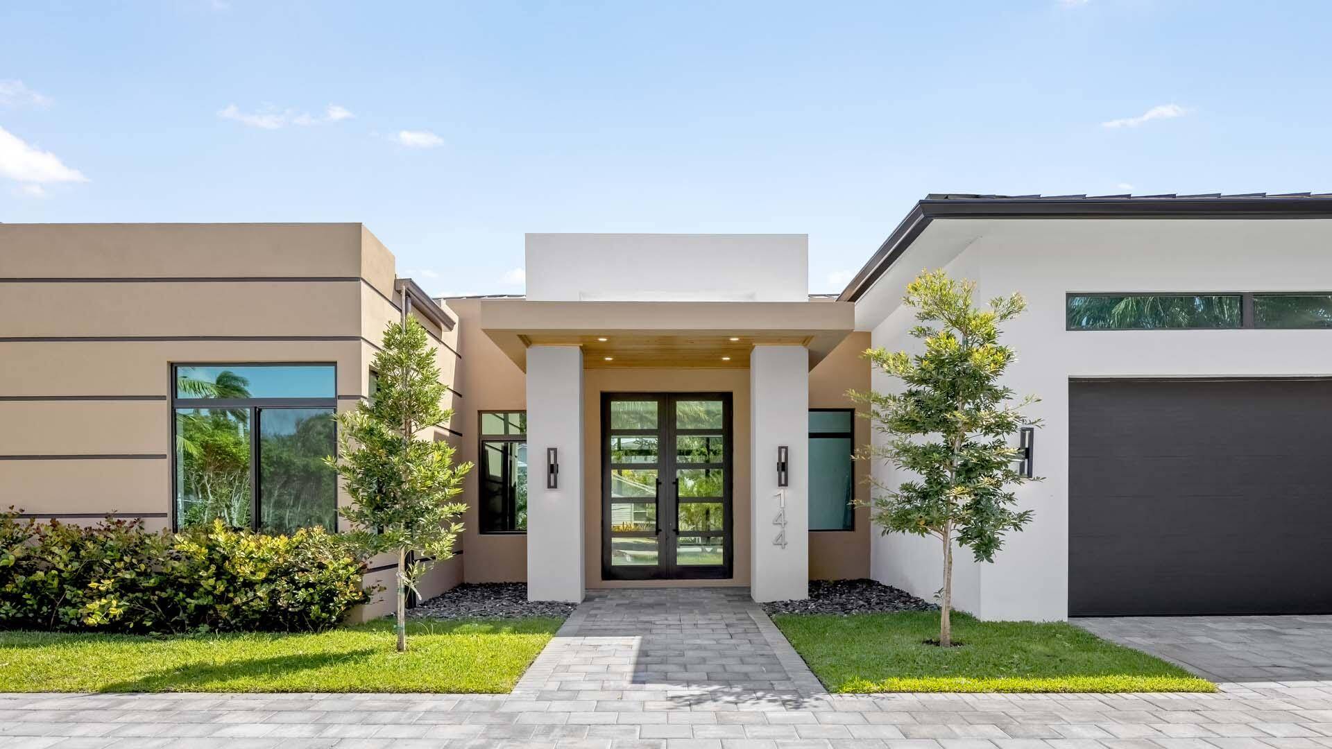 Welcome to 144 Coconut Road, a stunning brand new modern masterpiece just minutes from downtown Delray Beach and the ocean.