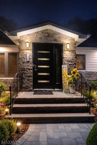 Stunning two family home in Old Bridge, NJ, offering a rare opportunity with updated roof, siding, and paver curb appeal.