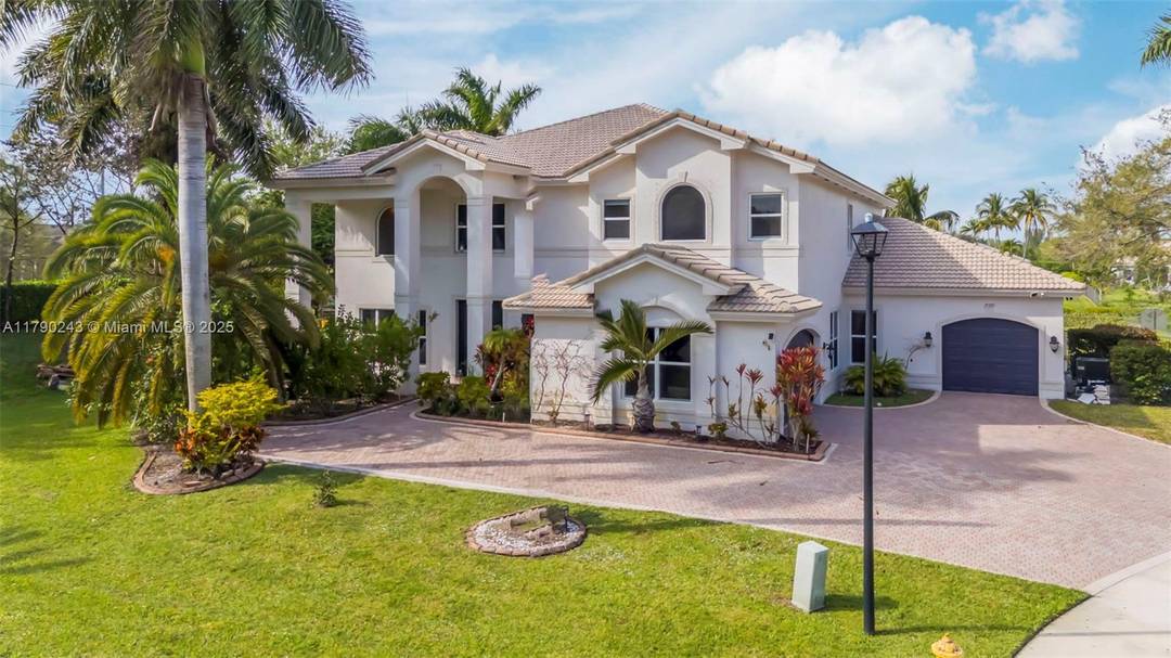 Luxury meets comfort with this beautiful property located in the heart of Davie in one of the most exclusive guard gated communities.