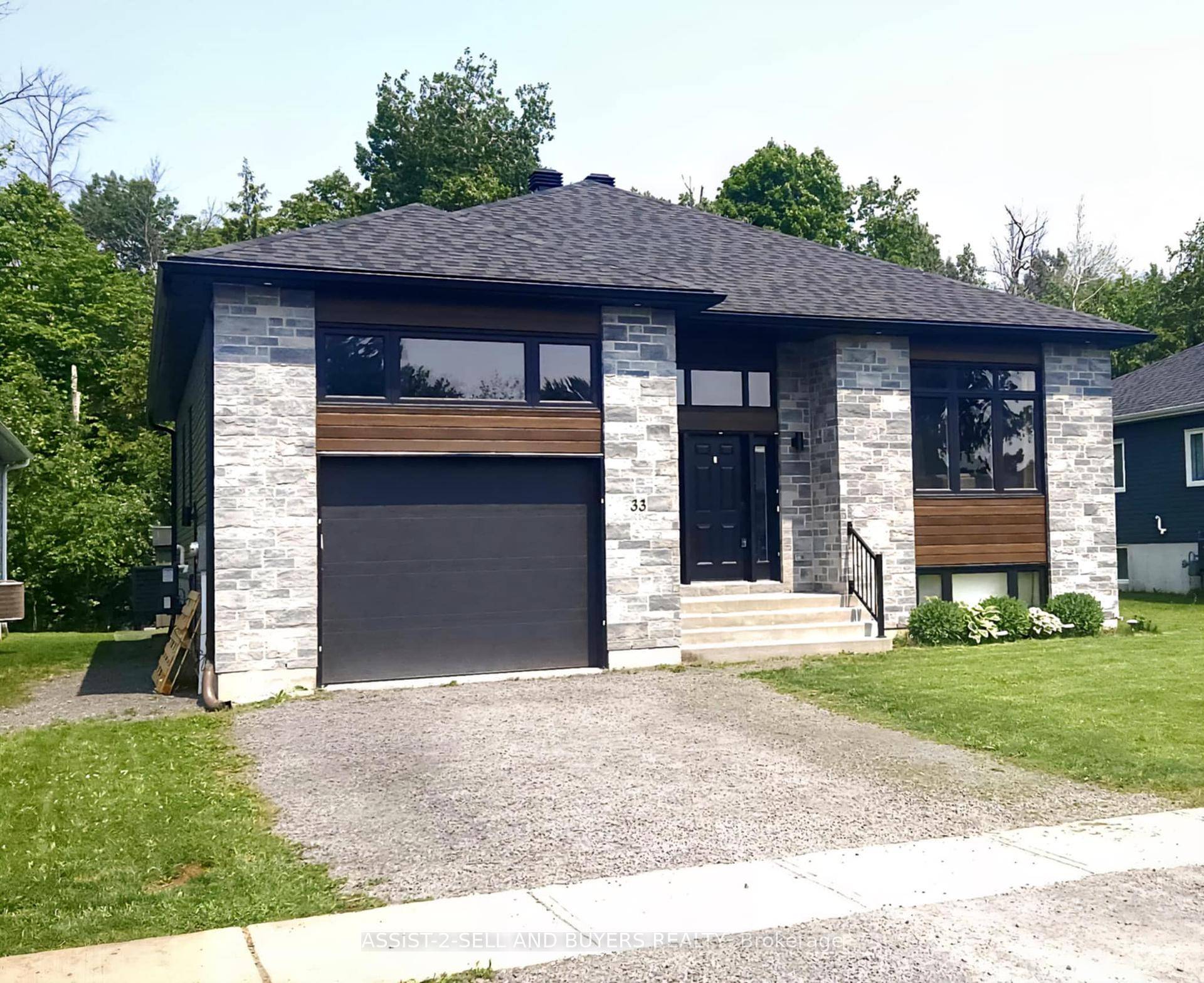 Welcome to this beautifully maintained, move in ready raised bungalow offering nearly 1600 sq ft of bright, open concept living space.