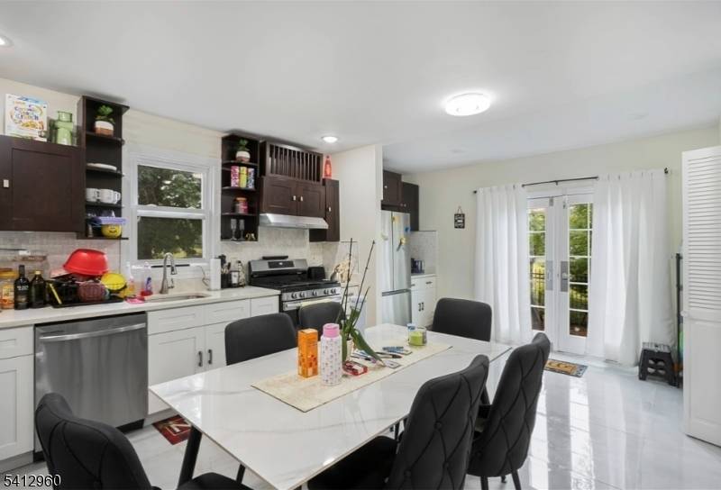 Come View This beautifully renovated two family house located in sought after Bloomfield !