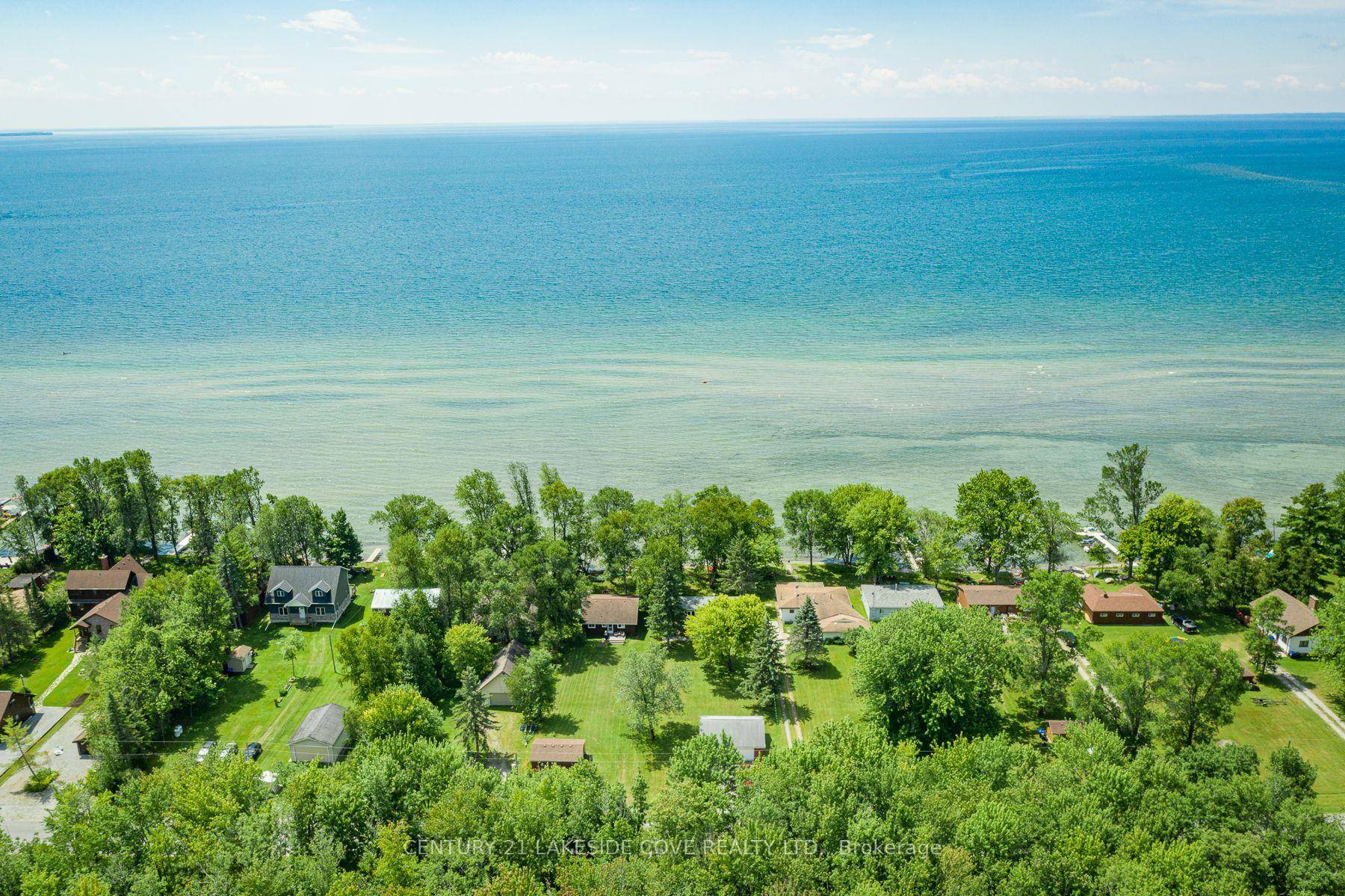 Lake Simcoe is Waiting For You in This Renovated Home Offering 3 Bedrooms, 2 Bathrooms and Sandy Beaches and Stunning Sunsets at Your Door.