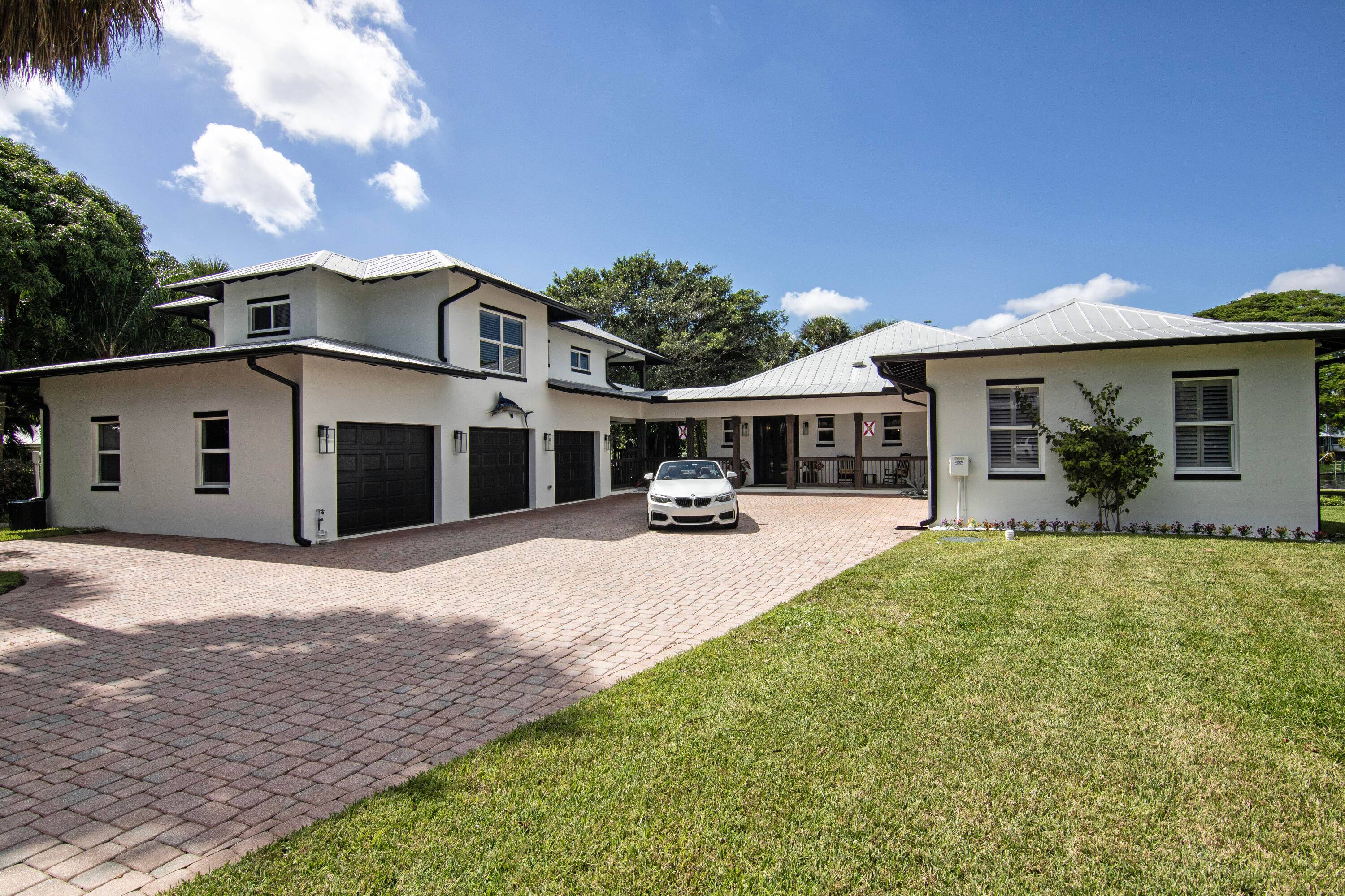 Beautiful home in St. Lucie Estates on historic Krueger Creek just a few houses in from the river.