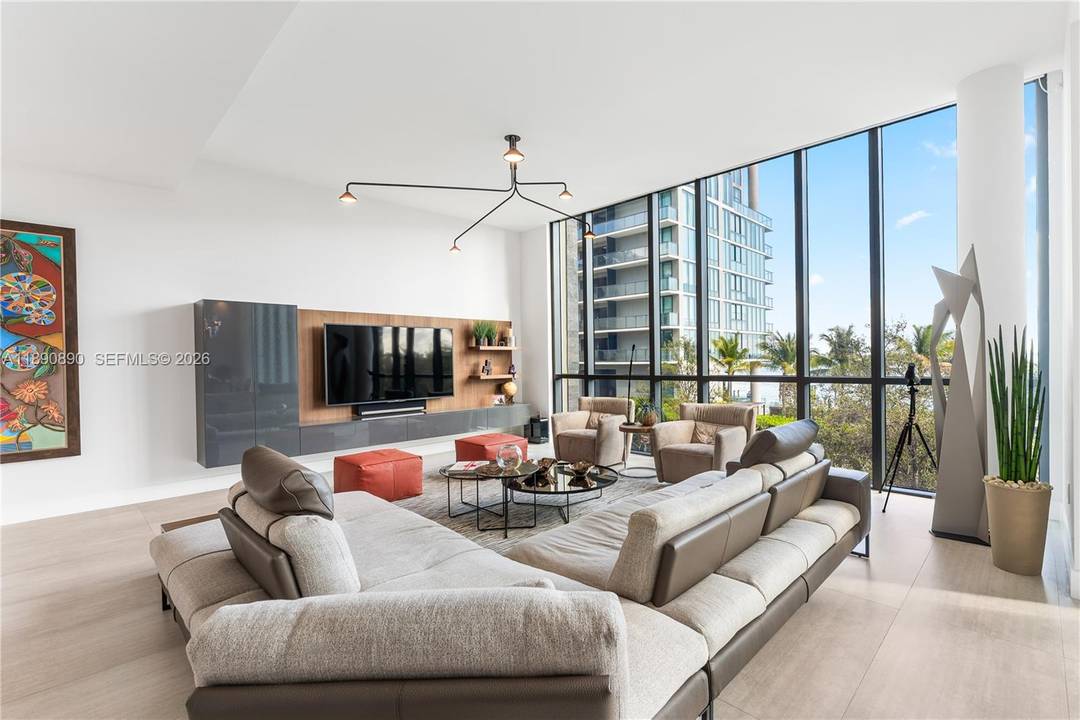 Looking for the feel of a SINGLE FAMILY HOME w the conveniences of a luxury high rise condo ?