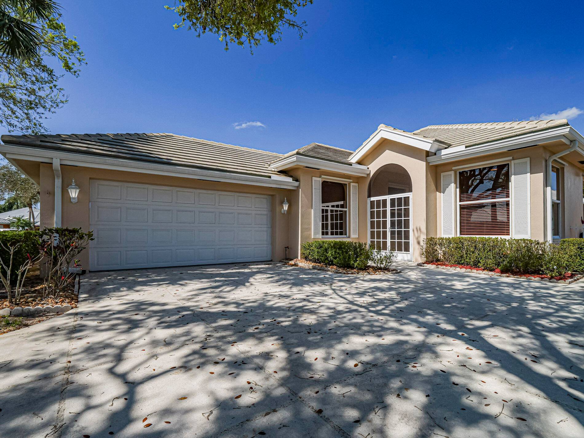 This turnkey Divosta 3BR 2BA CBS home sold fully furnished in the sought after gated community of The Meadows shows like a model.