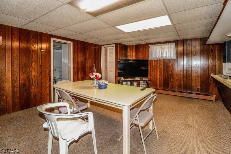 Welcome to this beautiful custom built brick ranch featuring 3 bedrooms, 2 full baths, 2 kitchens, oversized 1.