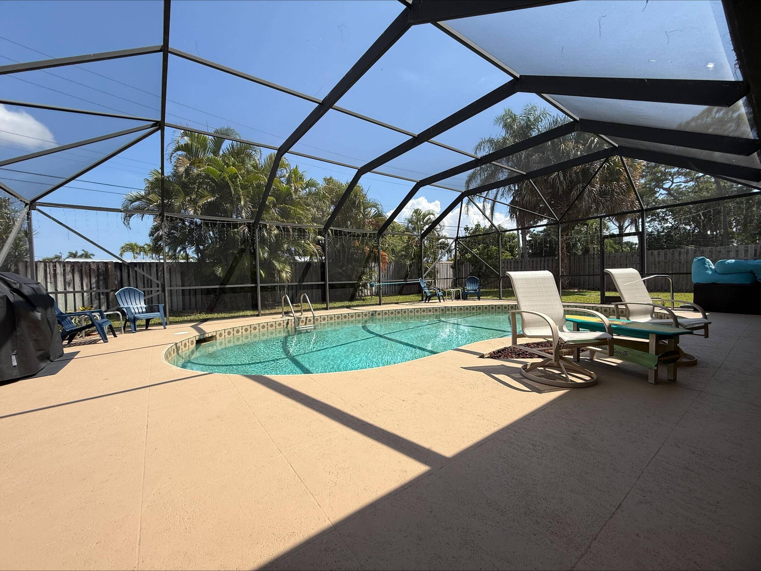 Discover a rare opportunity to own a stunning, NO HOA lakefront pool home overlooking Lake Osborne.