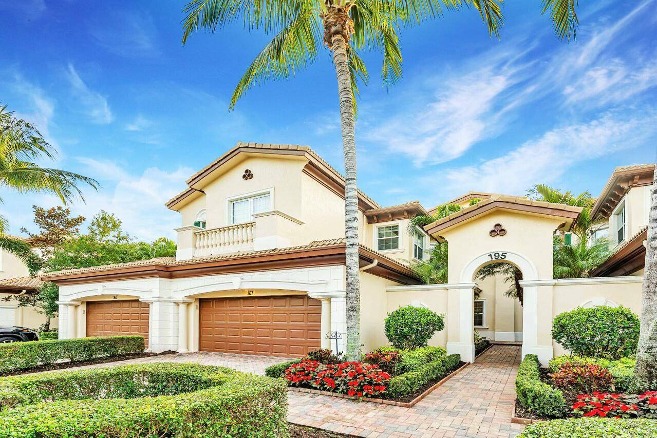 Welcome to an exquisite ground floor residence in the prestigious Jupiter Country Club where elegance meets effortless living.