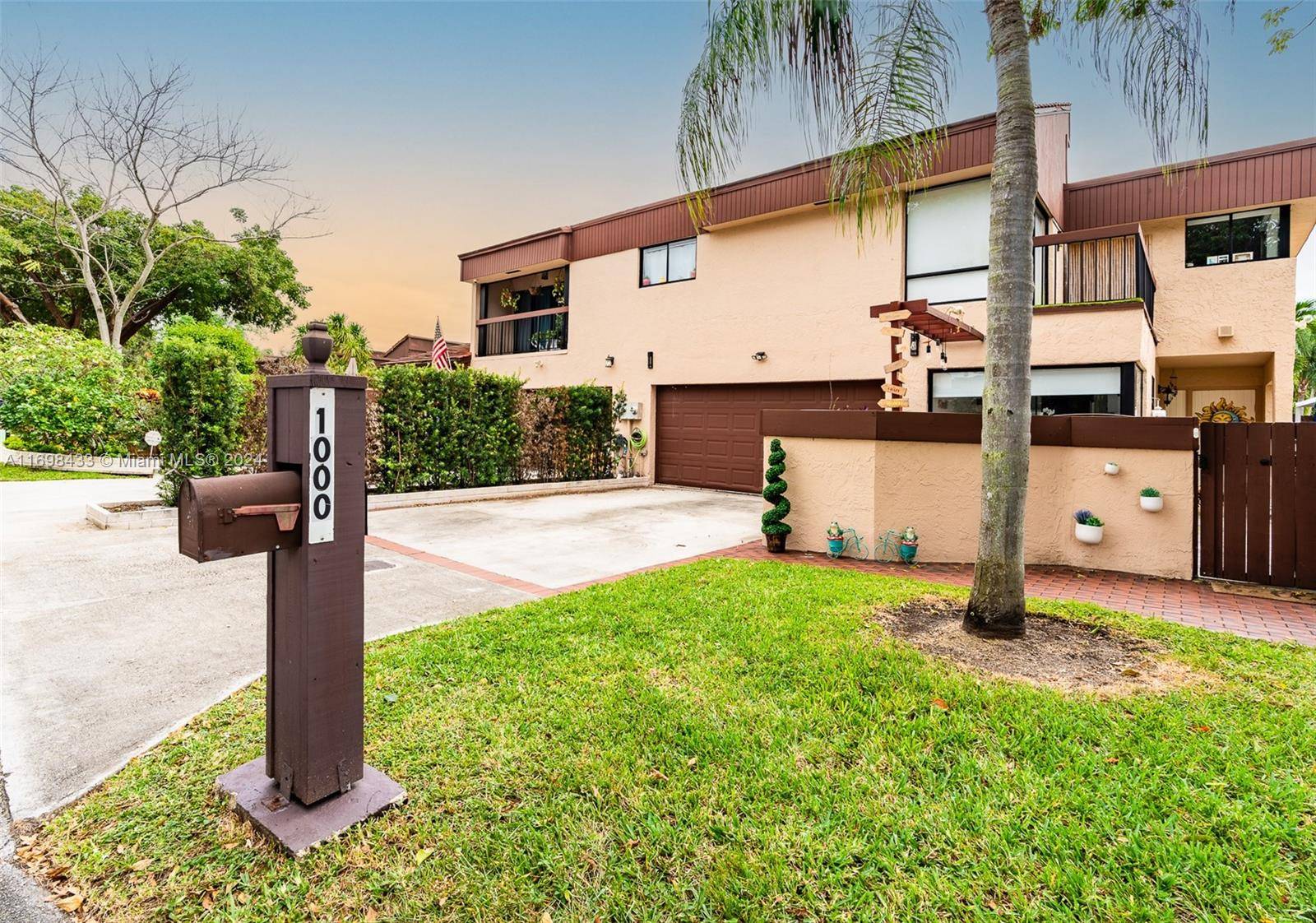 This stunning 4 bedroom, 3 bath home in California Club Homes, Miami, combines modern elegance with comfort.