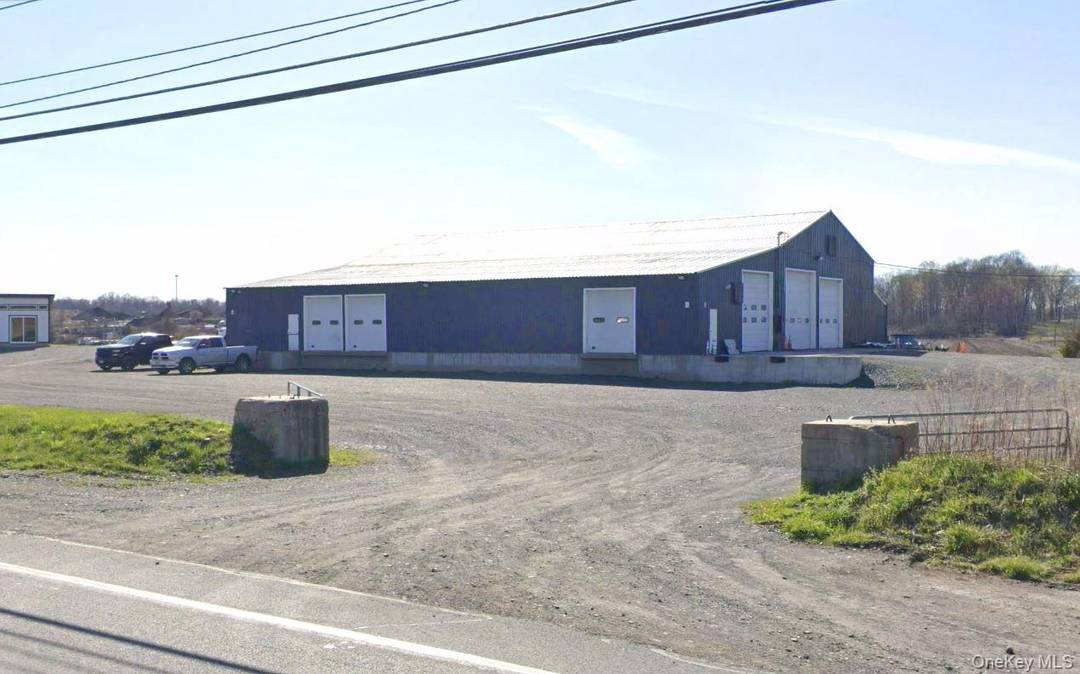 FOR SALE 9, 000 sqft main building plus 1, 000 sqft storage building in the rear.