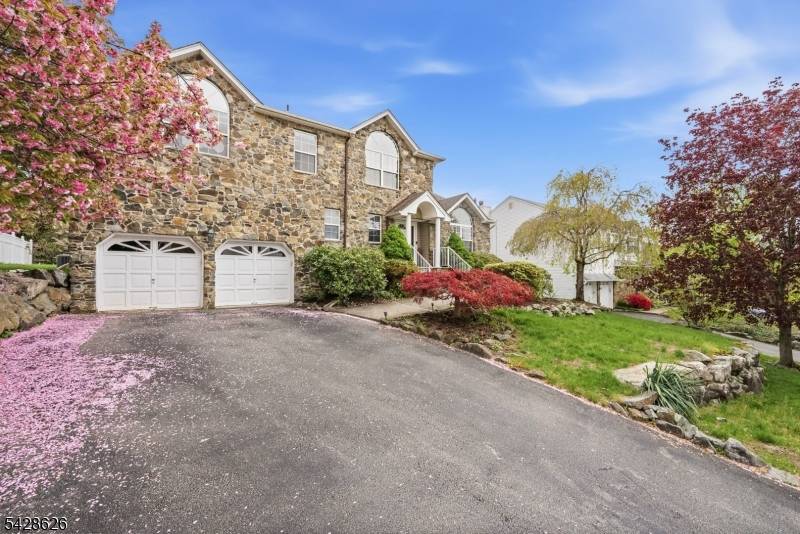 This commanding Colonial stands as a testament to meticulous maintenance and timeless design, offering massive value for the expansive living space provided.