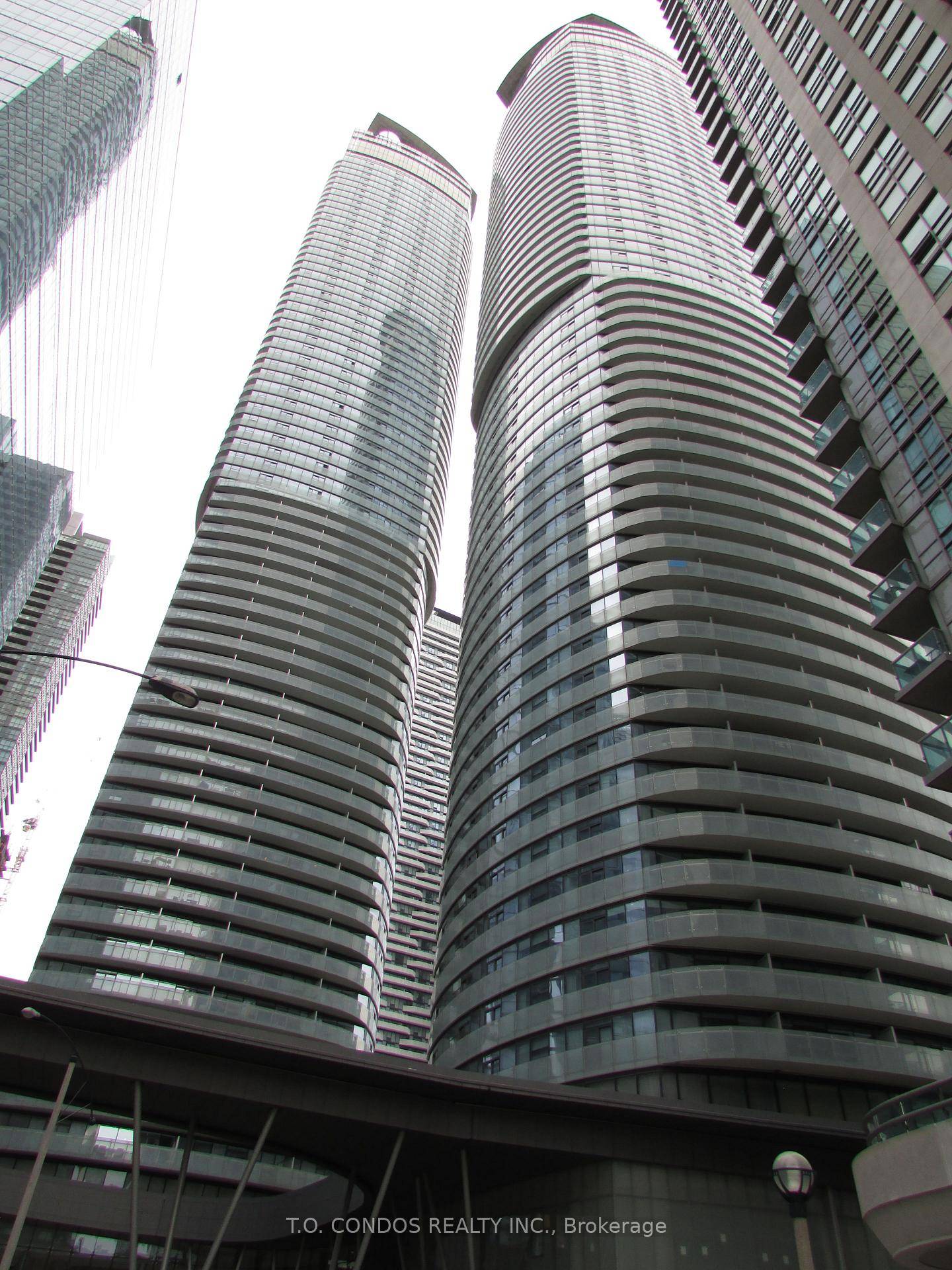 Welcome to sophisticated urban living at ICE 1 Condos this elegant 1 bedroom, 1 bathroom spans approximately 503 square feet, perched high on the 19th floor.