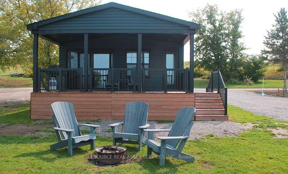 This almost brand new three bedroom haven exudes elegance and comfort, with bright, airy interiors and captivating views of the harbour and the serene North shore of the lake.