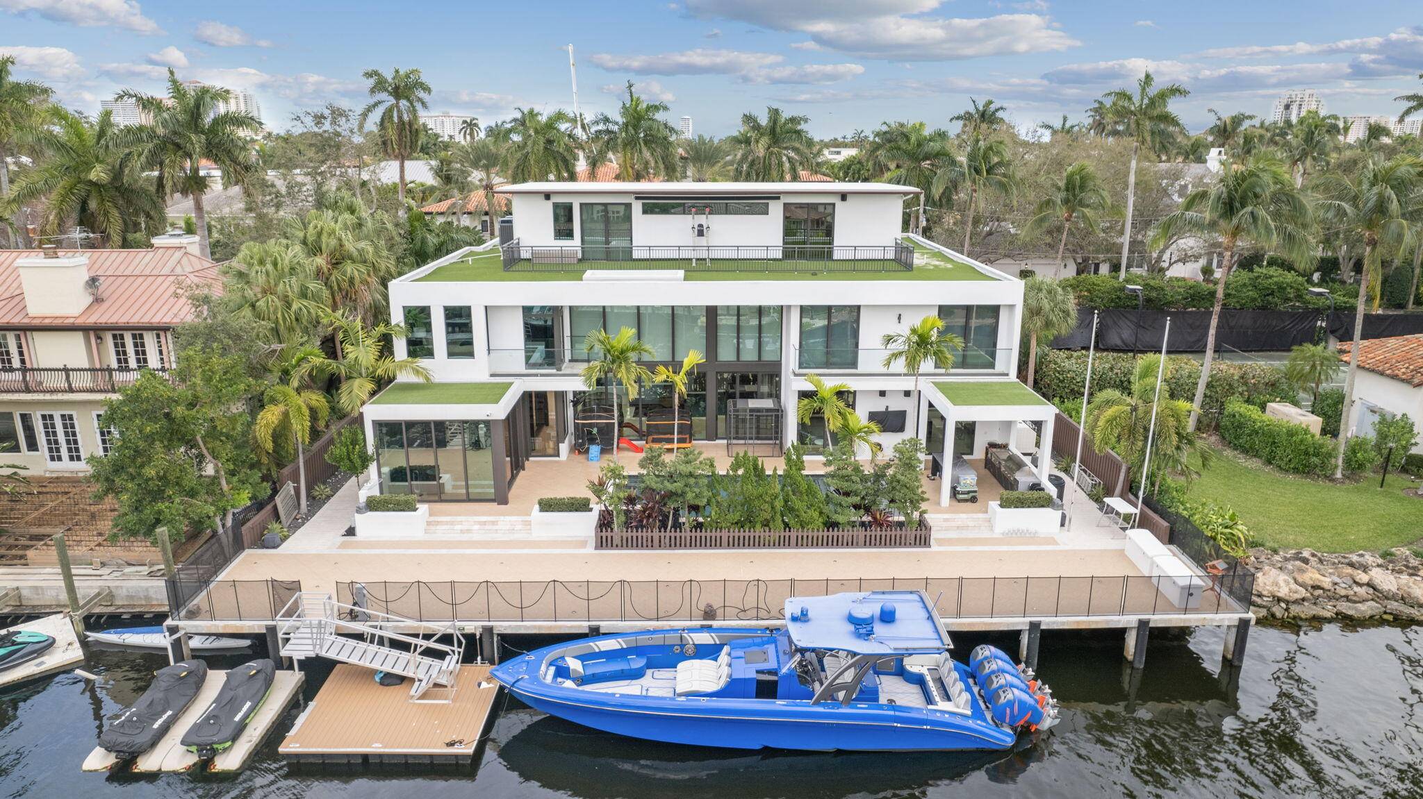 PRICED TO SELL This stunning, ultra modern masterpiece is a three story waterfront home.