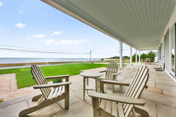 Coastal charm and luxurious one level living define this custom 3, 700 sq.