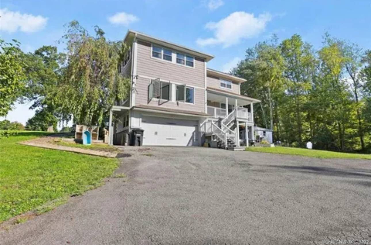 Large Colonial at the end of culdesac, home offers over 3, 500 sq ft of living space on approximately 3 acres.