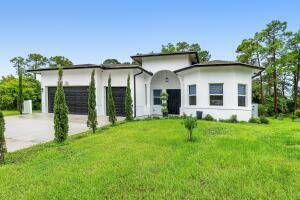 CONSTRUCTED IN 2023 IMPACT GLASS SOLAR PANELS CITY WATER 3 CAR GARAGE NO HOA CONTEMPORARY DESIGN 1.